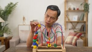 Early signs of Parkinson’s disease illustrated by subtle symptoms like hand tremor, stiffness, balance changes, and fatigue in older adults